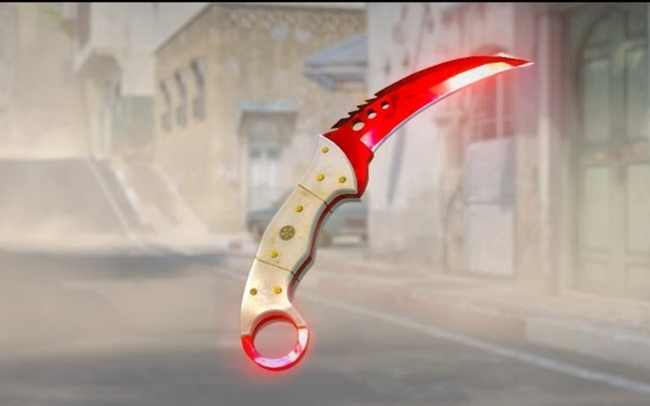 Stylowy nóż w kształcie zakrzywionym, z ozdobnym uchwytem.