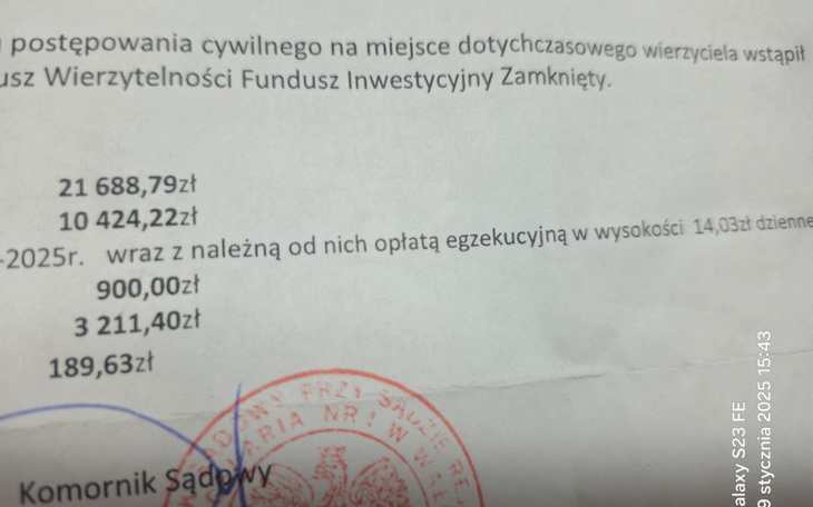 Dokument sądowy z pieczęcią i danymi finansowymi.