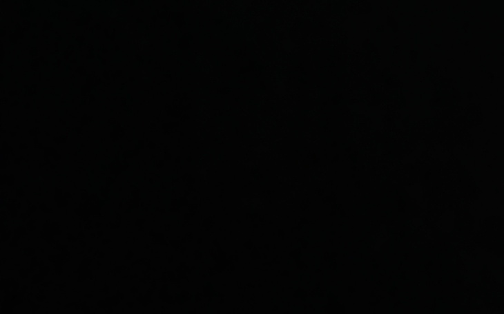 Ciemny obraz, prawdopodobnie bez widocznych szczegółów.