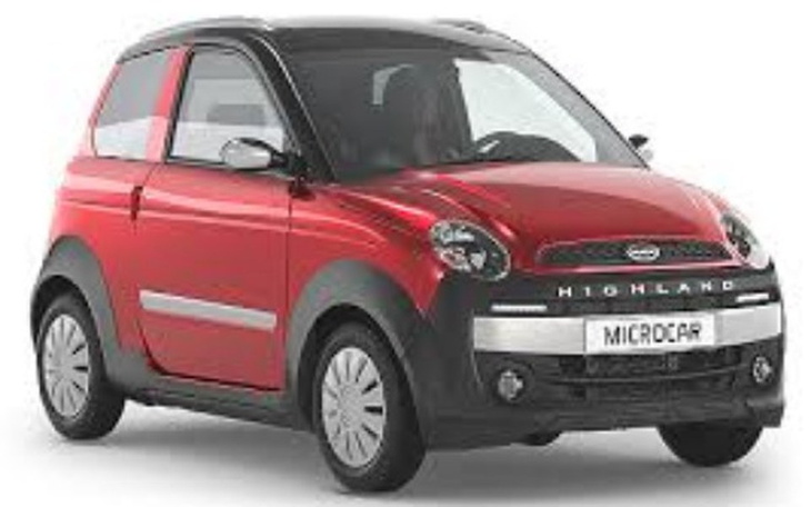 Mały czerwony samochód, idealny do miejskich warunków.