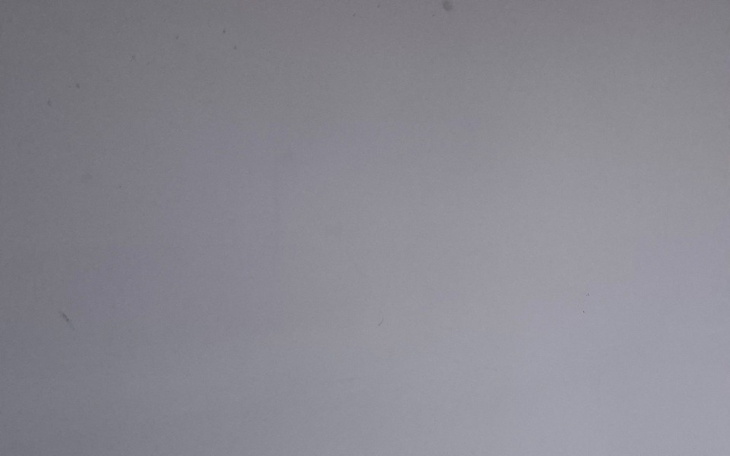 Jednolita szara powierzchnia, bez wyraźnych detali.