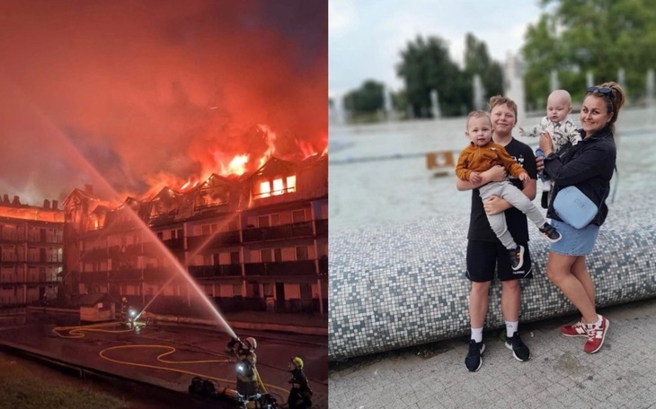 Pożar budynku, strażacy walczą z ogniem w nocy.