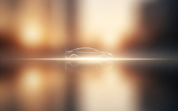 Stylowy samochód w blasku zachodzącego słońca.