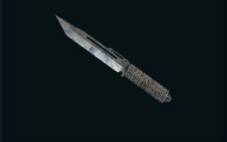 Nóż z metalowym ostrzem i owijanym uchwytem.