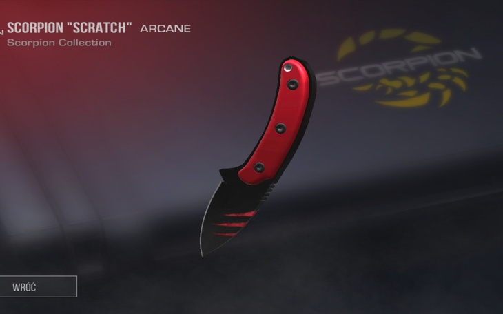 Czerwony nóż z kolekcji Scorpion, z charakterystycznym wzorem na ostrzu.