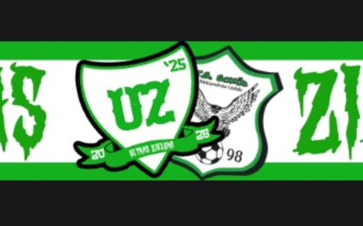 Logo drużyny piłkarskiej z zielonymi akcentami.