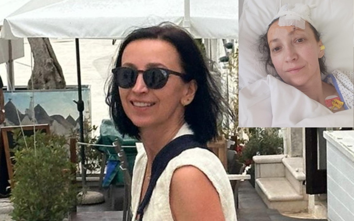 Kobieta w okularach przeciwsłonecznych na tle plaży.