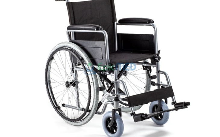 Wózek inwalidzki, symbol wsparcia dla osób z niepełnosprawnościami.