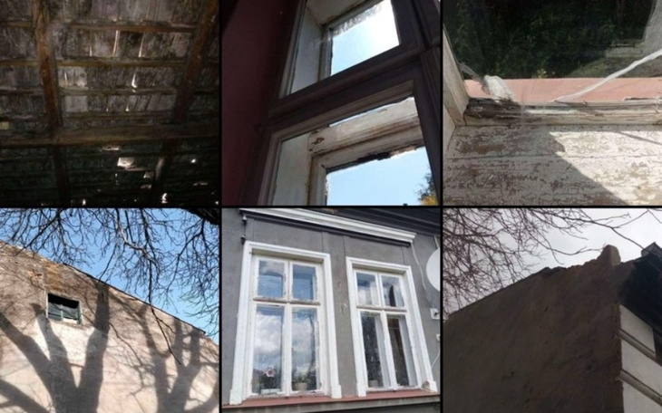 Zniszczone okna i dach budynku, z widokiem na niebo.