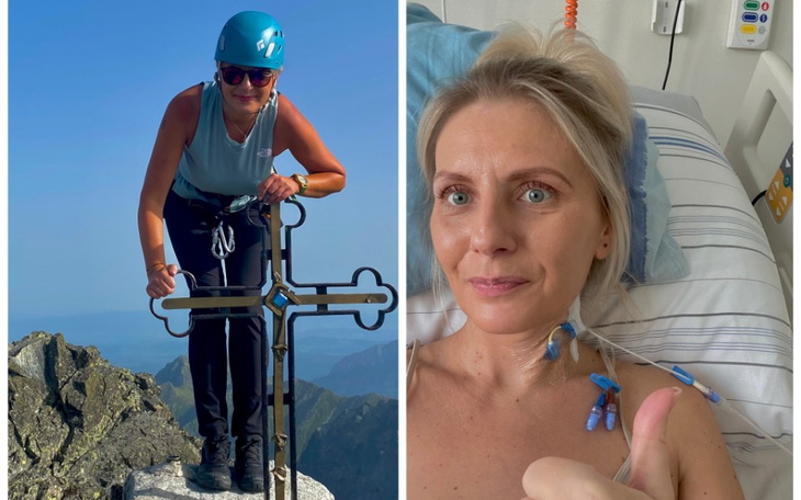 Kobieta na szczycie góry z krzyżem, w tle widok na dolinę.