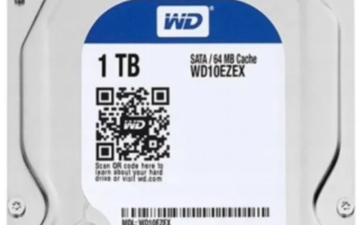 Dysk twardy WD 1 TB, przedstawiający jego etykietę i specyfikacje.