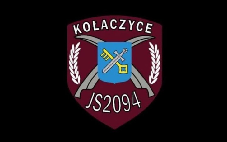 Herb z napisem 'Kołaczyce' i symbolami kluczy oraz mieczy.