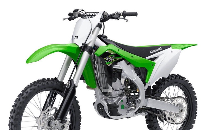 Motocykl terenowy Kawasaki w intensywnym zielonym kolorze.