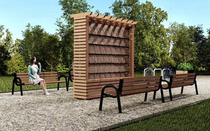 Nowoczesna przestrzeń rekreacyjna z drewnianymi ławkami.