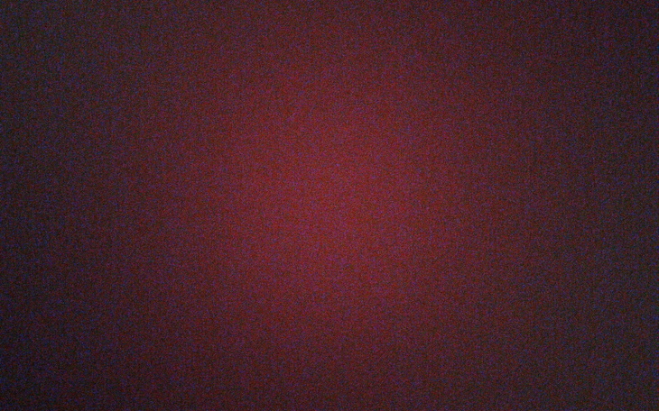 Ciemne tło z delikatnym odcieniem czerwieni.