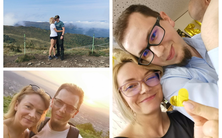 Para na szczycie góry, ciesząca się widokiem.