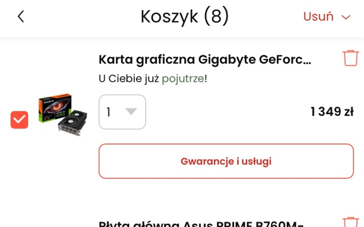 Koszyk zakupowy z kartą graficzną i innymi produktami.