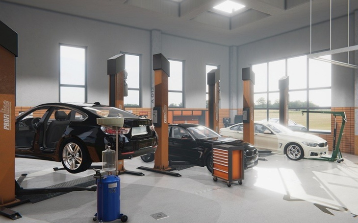 Warsztat samochodowy z podniesionymi pojazdami i narzędziami.