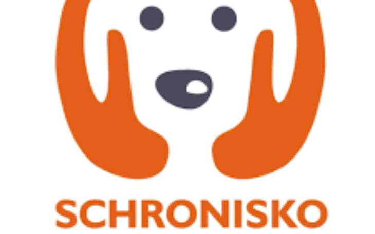 Logo schroniska dla zwierząt z wizerunkiem psa.