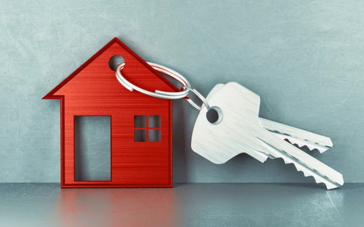 Kota śpiącego na kocyku, z zamkniętymi oczami.