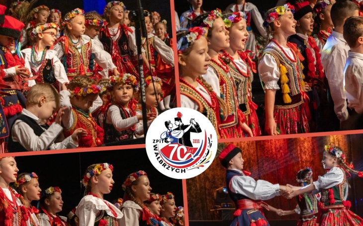 Dzieci w tradycyjnych strojach ludowych podczas występu.