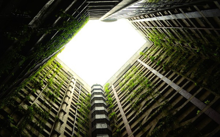 Zielony budynek z roślinnością w architekturze.