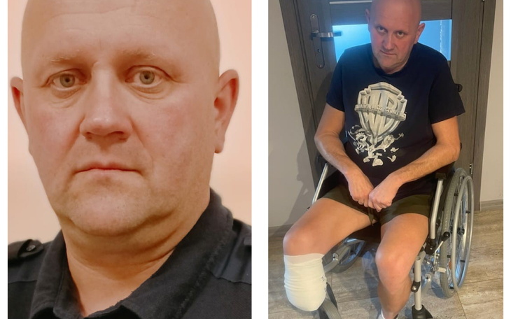 Mężczyzna w koszulce z logo, siedzący na wózku inwalidzkim.