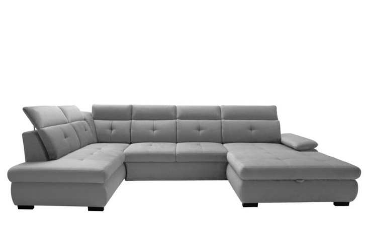 Szary narożnikowy sofa w minimalistycznym stylu.