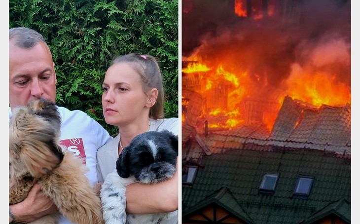 Para z psami w tle, widać pożar w budynku.