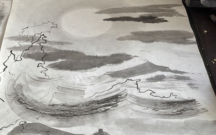 Rysunek przedstawiający krajobraz z morzem i chmurami.