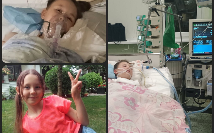 Dziecko w szpitalu z maską tlenową, otoczone sprzętem medycznym.