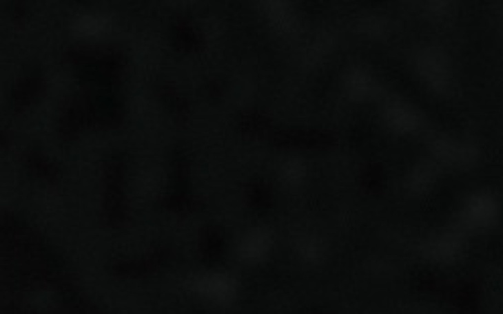 Ciemne tło, tekstura w odcieniach czerni.