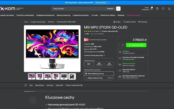 Dziecko z uśmiechem trzymające pluszowego misia.