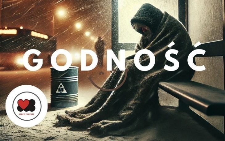 Osoba siedząca na przystanku, owinięta w koc, w zimowej scenerii.