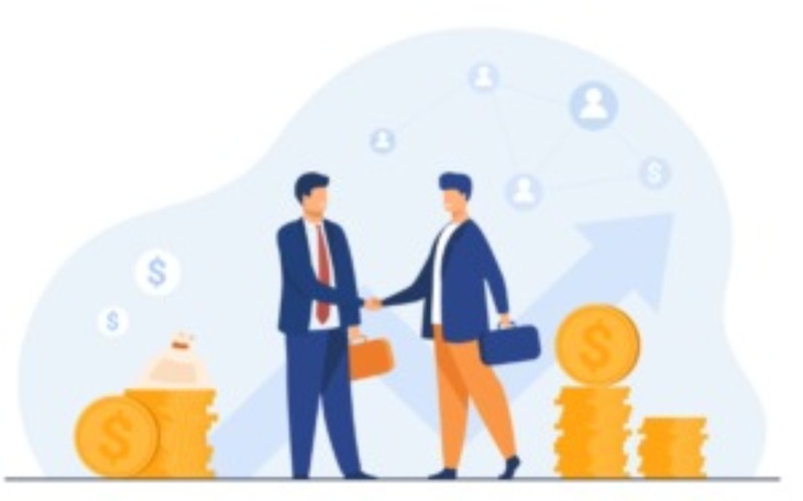 Dwóch mężczyzn w garniturach uścisnęło sobie dłonie w biznesowej atmosferze.