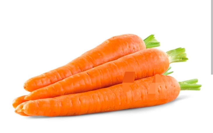 Trzy marchewki na białym tle.