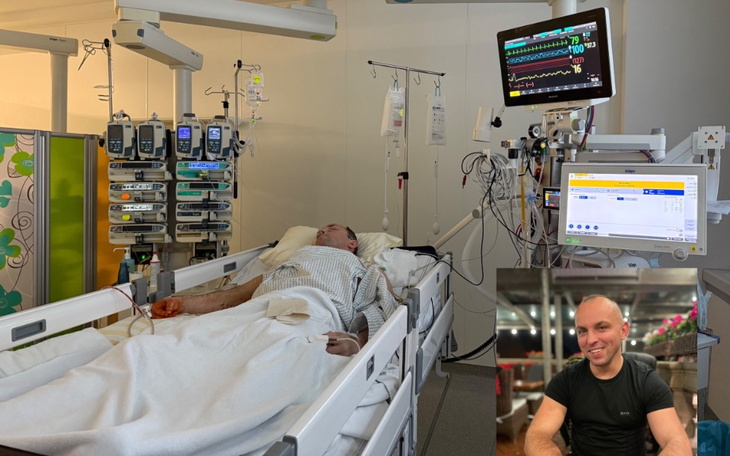 Pacjent w szpitalnym łóżku z monitorami medycznymi.