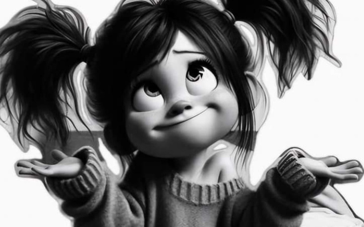 Uśmiechnięta dziewczynka z kokardkami w włosach, wyrażająca radość.