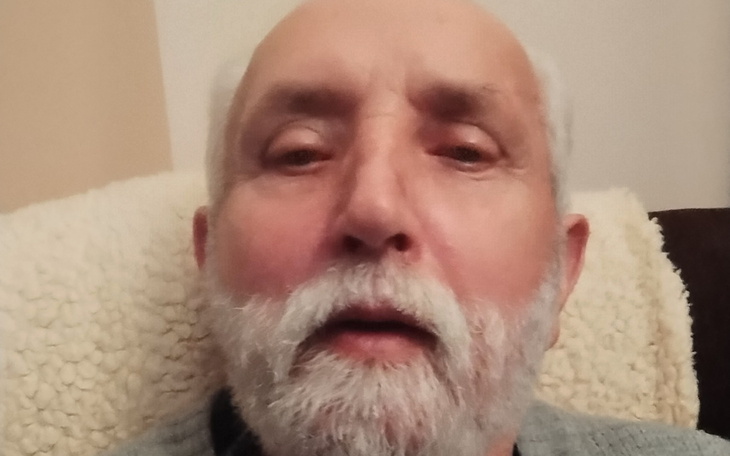 Portret starszego mężczyzny z brodą.