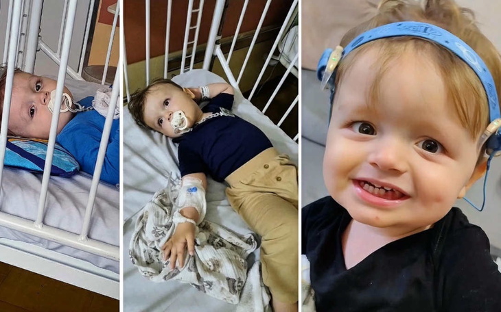 Chłopiec w szpitalu, leżący na łóżku z uśmiechem.