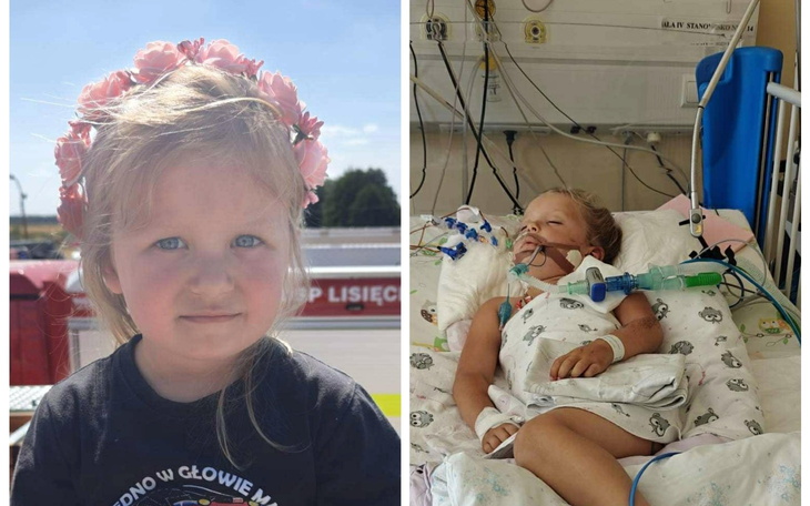 Dziecko z kwiatami we włosach, uśmiechające się.