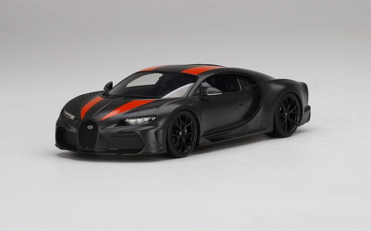 Model samochodu Bugatti Chiron w czarno-czerwonym kolorze.