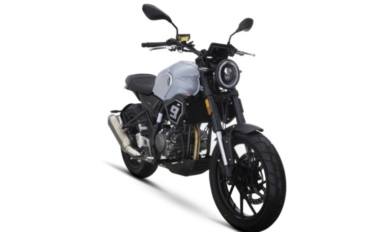 Motocykl w stylu retro na białym tle.