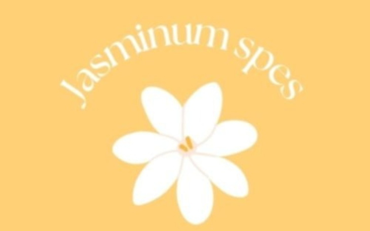Kwiat jaśminu na żółtym tle, symbolizujący nadzieję.