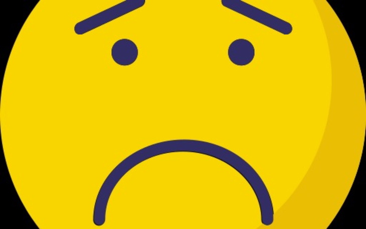 Smutna emotikonka z wyraźnym smutkiem na twarzy.