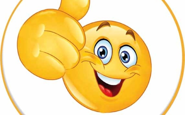 Uśmiechnięta emotikonka z kciukiem w górę.