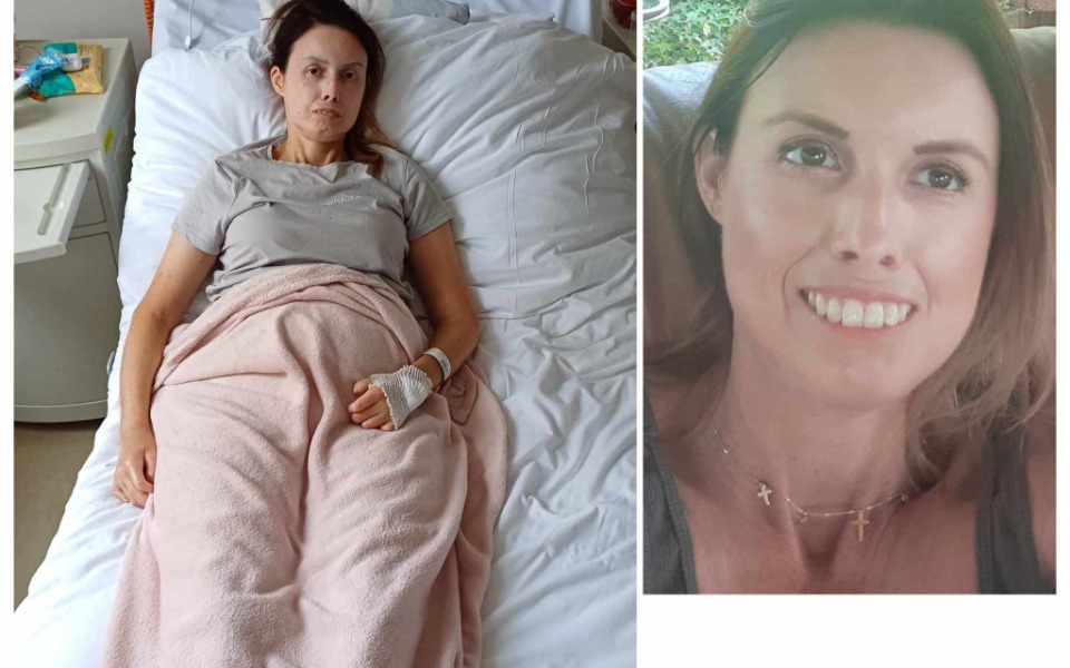 
        Kobieta leży w szpitalnym łóżku, wygląda na zmęczoną.
    