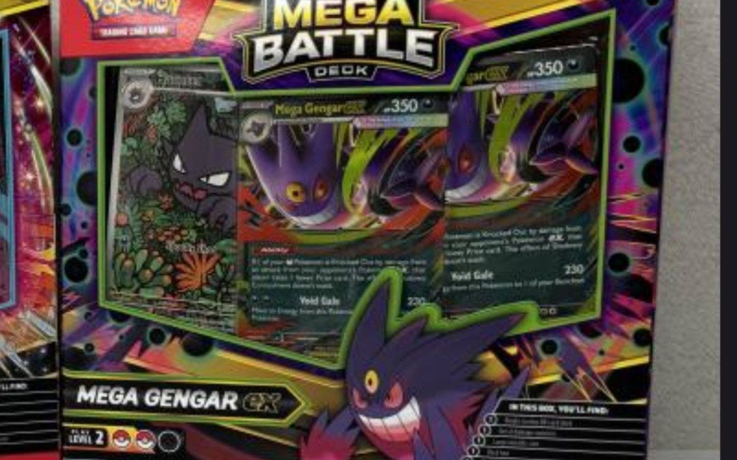 
        Zestaw kart do gry Mega Battle Deck z Mega Gengarem.
    