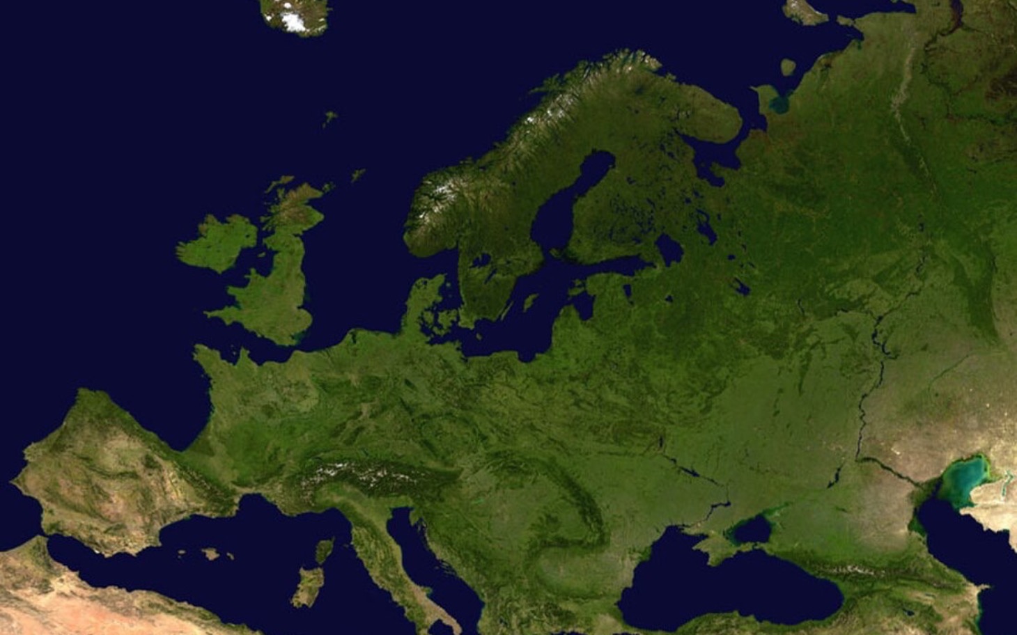 
        Zdjęcie satelitarne Europy, z widocznymi górami i lądami.
    