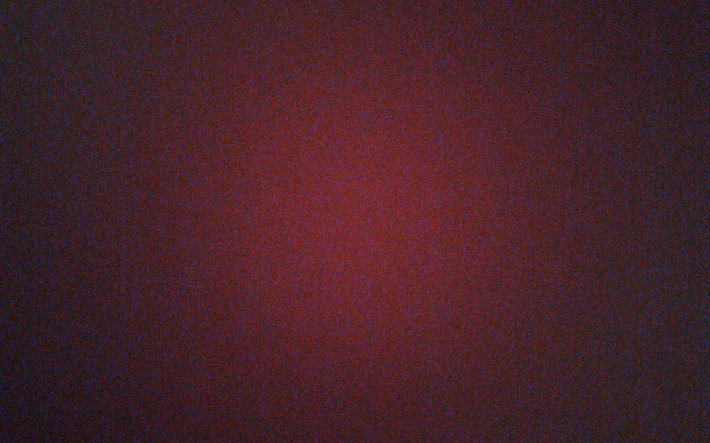 
        Ciemne tło z delikatnym odcieniem czerwieni.
    